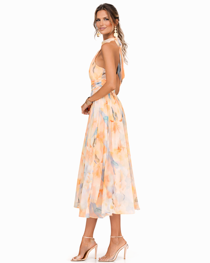 Layla | Watercolor print halter neck midi dress with flowing fit