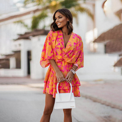 Liorael | Chic mini dress with wrap design and tie waist