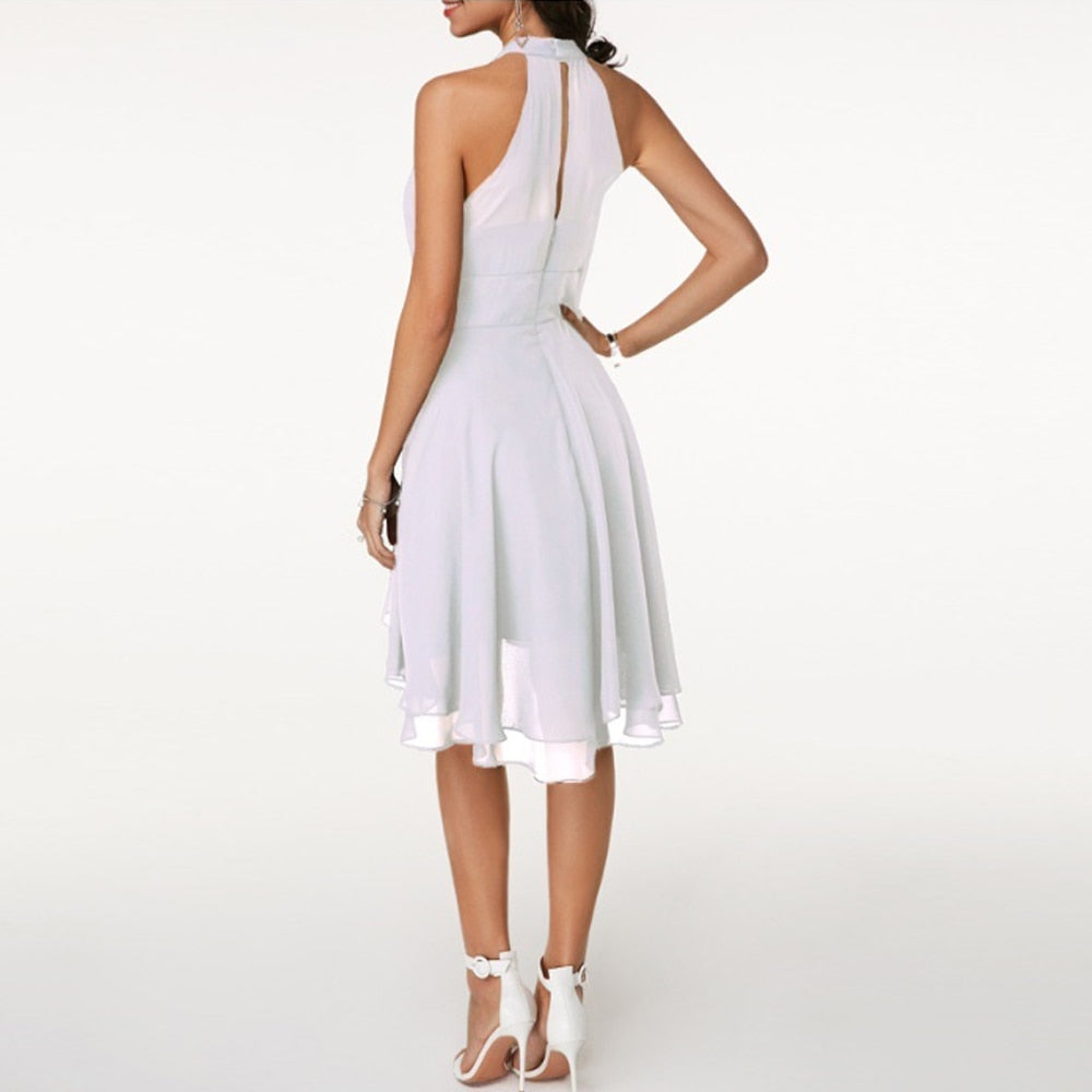 Elmira | Chic dress with halter neckline and layered skirt