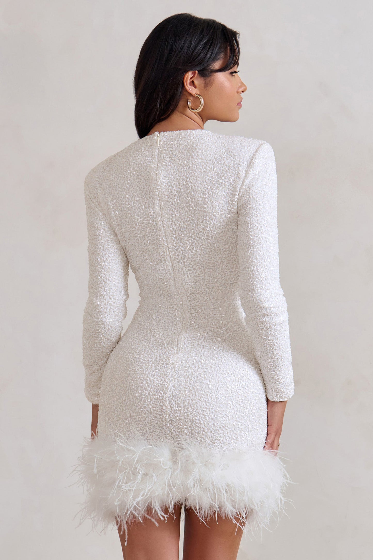 Harper | Elegant mini dress with feather trim hem