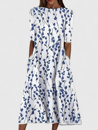 Karelia | Sophisticated floral midi dress with short sleeves