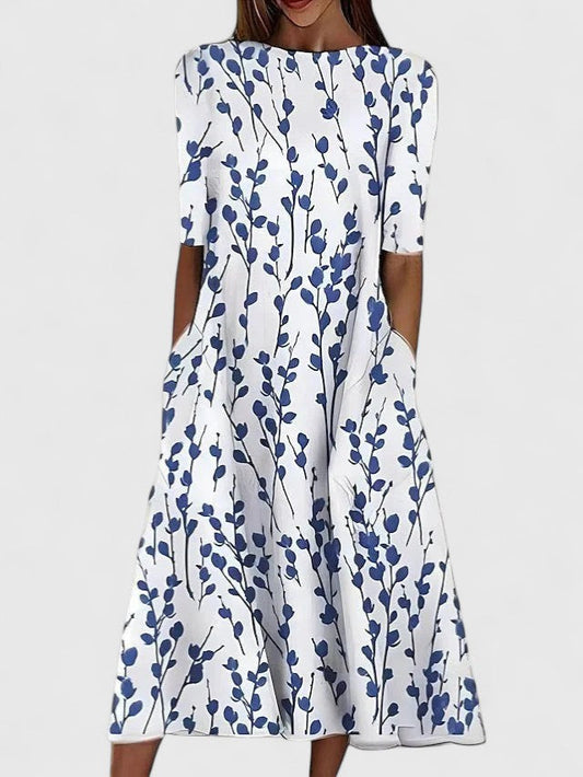 Karelia | Sophisticated floral midi dress with short sleeves